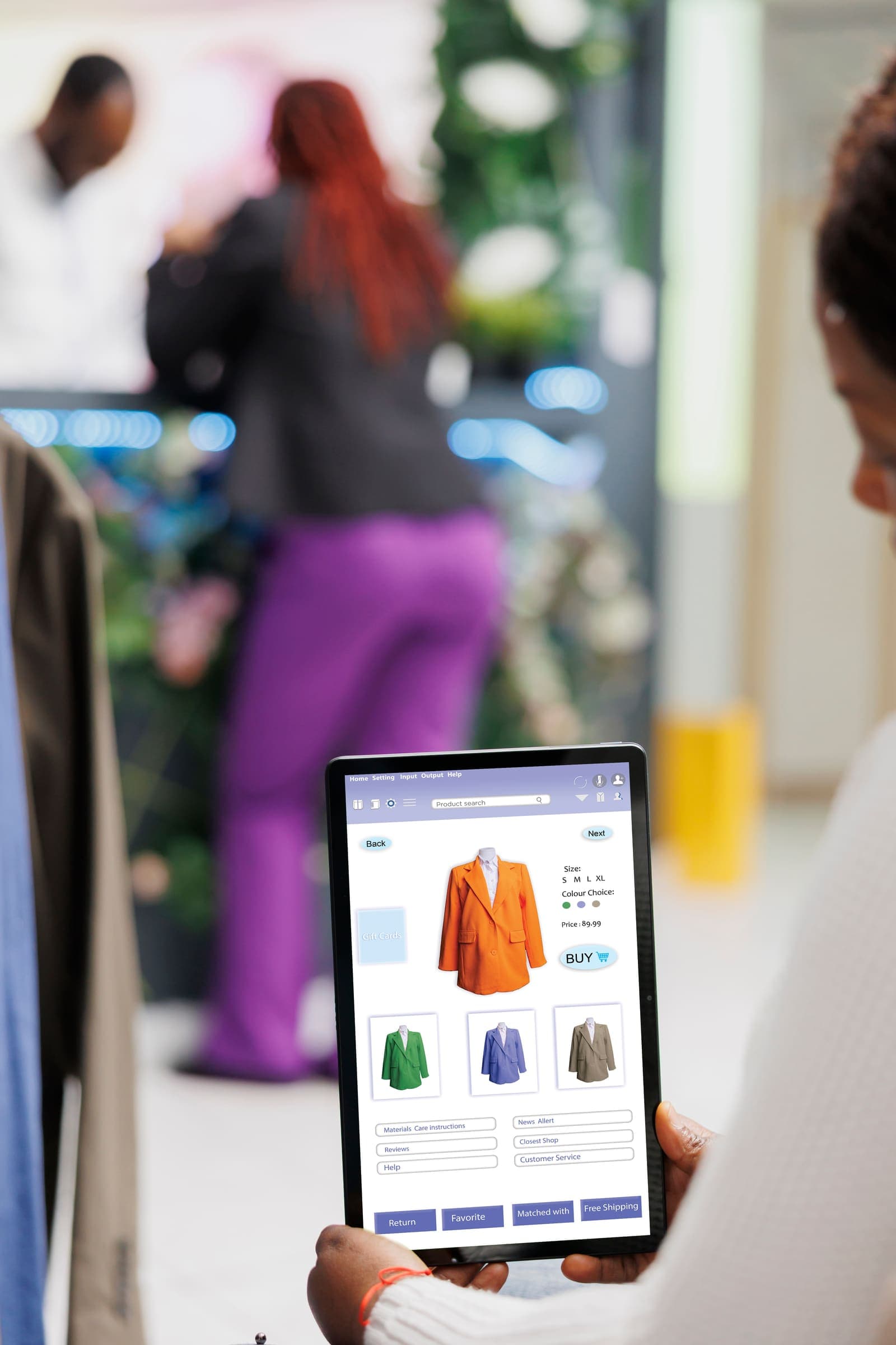 A shopper using a modern omnichannel retail POS system on a tablet in-store